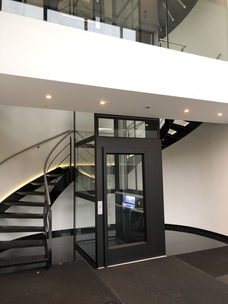 Thang Máy Gia Đình Cửa Mở Bản Lề